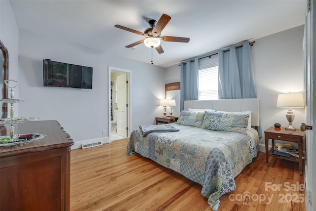 968 Waverly Ave, Rock Hill, SC 29730 - bedroom with wood finished floors, baseboards, ceiling fan, and ensuite bathroom
