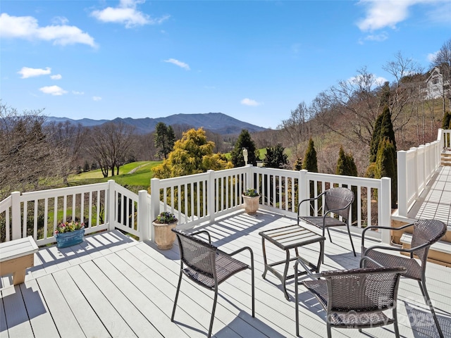 wooden terrace with a mountain view