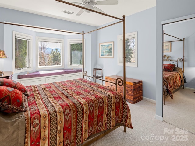 carpeted bedroom featuring ceiling fan