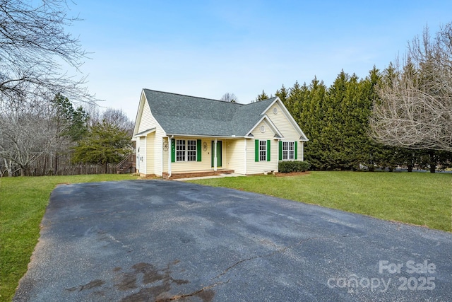 view of front of house with a front lawn