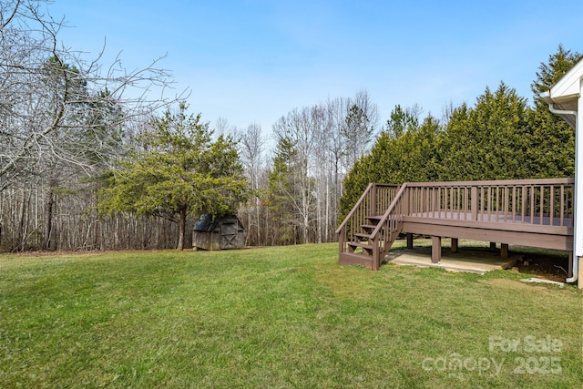 view of yard with a deck