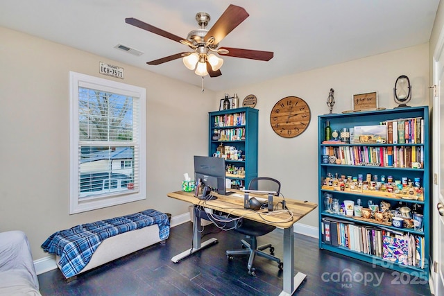 office with dark hardwood / wood-style flooring and ceiling fan