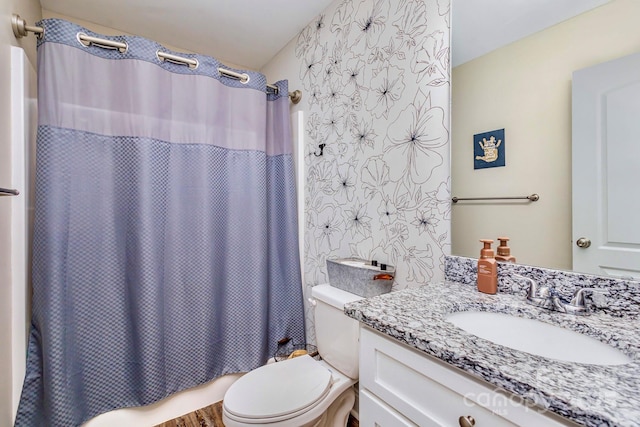 full bathroom with toilet, vanity, and shower / bathtub combination with curtain