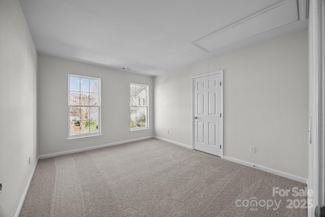 view of carpeted spare room