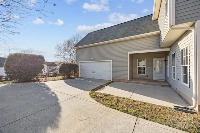 view of home's exterior with a garage