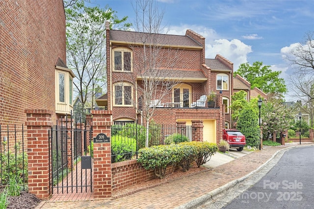 309 Settlers Ln, Charlotte, NC 28202 - view of front of property with brick siding, a gate, and a shingled roof