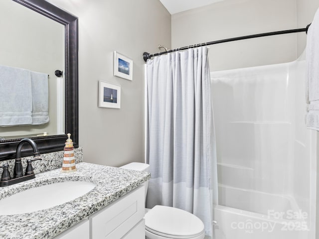 full bathroom with vanity, toilet, and shower / bathtub combination with curtain