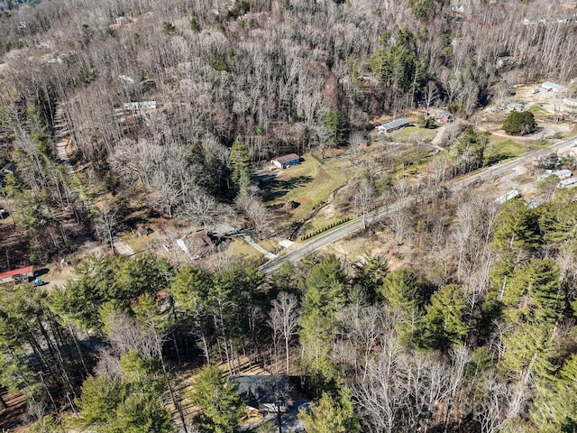 aerial view with a wooded view