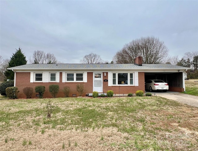 ranch-style house with a carport, brick siding, driveway, and a chimney