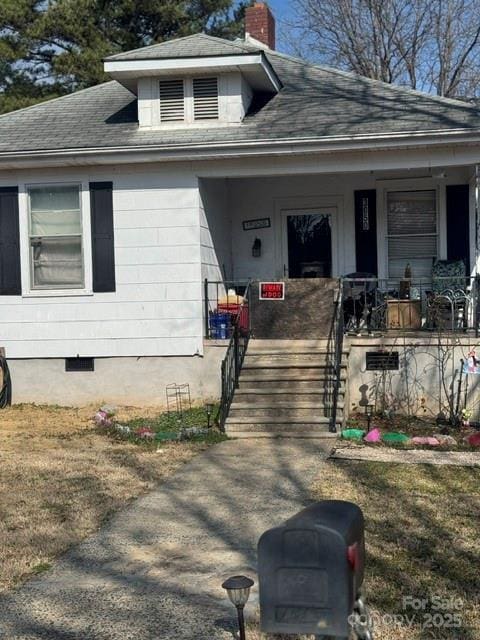 bungalow-style home featuring a porch