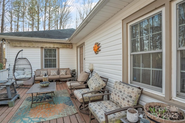 wooden deck featuring an outdoor living space