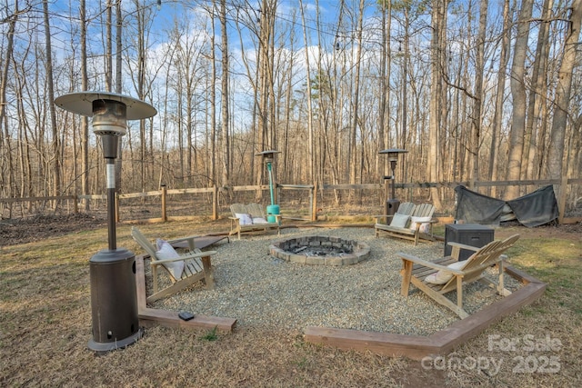 view of yard featuring a fire pit