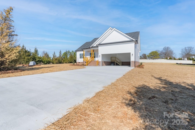 view of front of property featuring covered porch