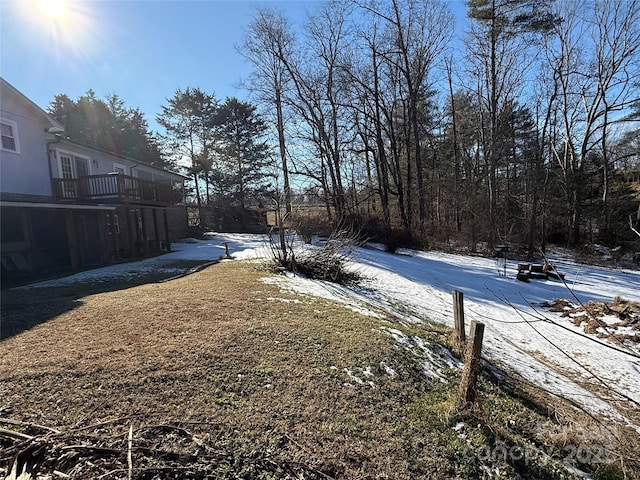 view of yard covered in snow