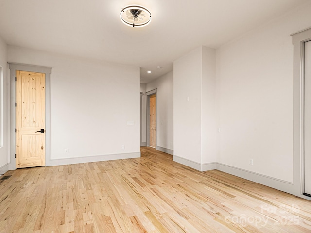 246 Half Moon Mile, Lake Lure, NC 28746 - spare room featuring wood finished floors, baseboards, and recessed lighting