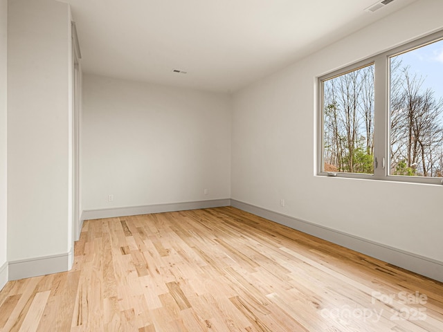 246 Half Moon Mile, Lake Lure, NC 28746 - empty room featuring wood finished floors and baseboards