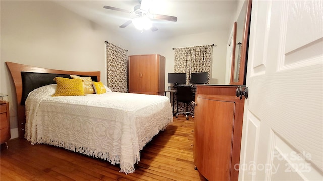 bedroom featuring ceiling fan and light hardwood / wood-style flooring