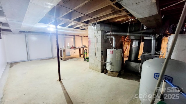 basement featuring water heater