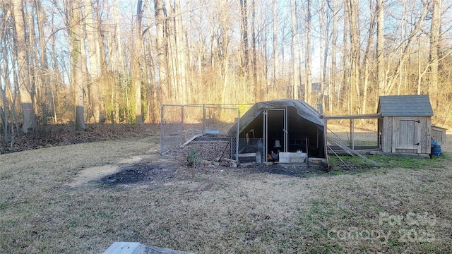 view of outbuilding with a lawn