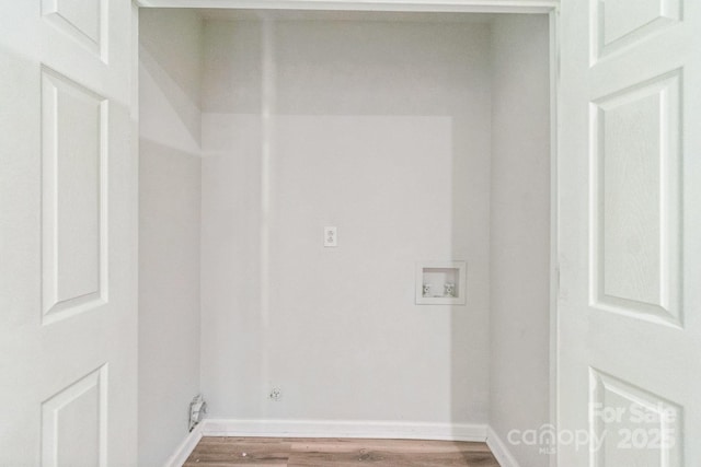711 E John St, Matthews, NC 28105 - laundry area featuring hookup for a washing machine, wood finished floors, and hookup for a gas dryer