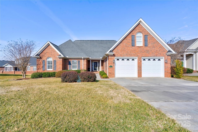 front of property featuring a garage and a front lawn