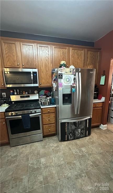 kitchen with appliances with stainless steel finishes