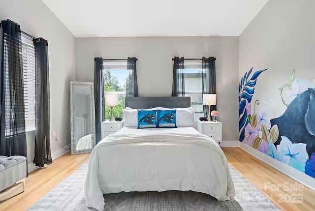 bedroom featuring hardwood / wood-style flooring