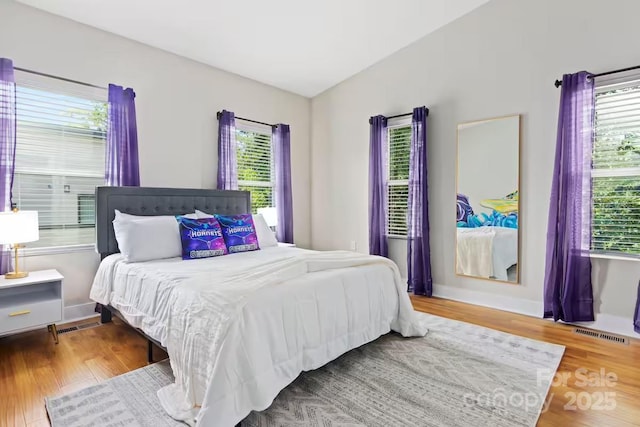 bedroom featuring hardwood / wood-style flooring