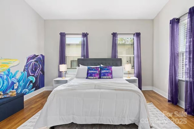 bedroom featuring hardwood / wood-style flooring