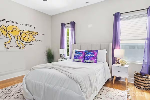 bedroom featuring hardwood / wood-style flooring