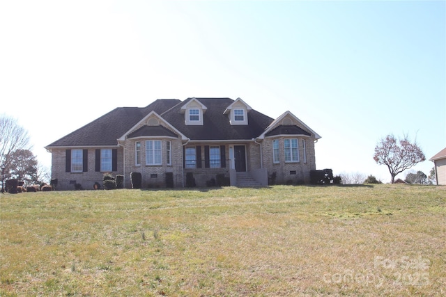 view of front of property with a front lawn