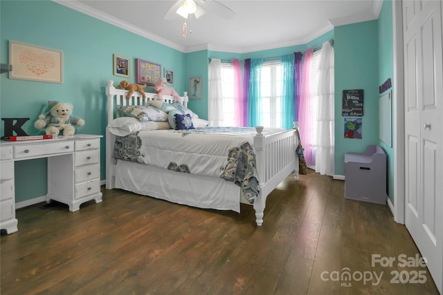 bedroom with dark wood-type flooring, ceiling fan, and crown molding