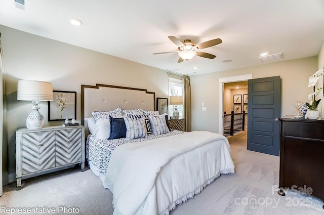 carpeted bedroom with ceiling fan