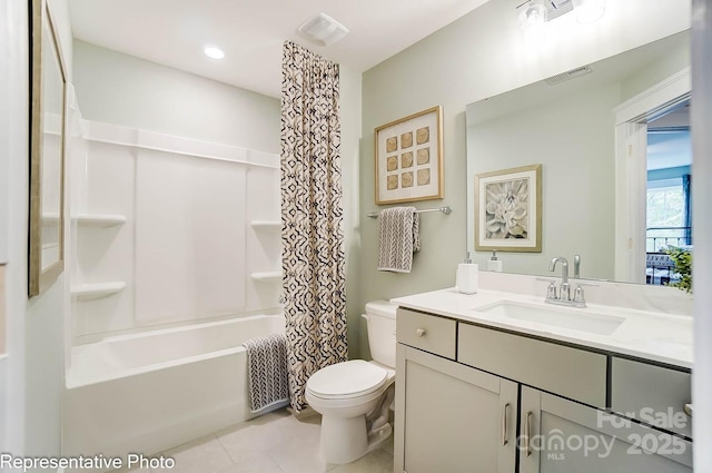 full bathroom featuring tile patterned floors, vanity, toilet, and shower / bath combo