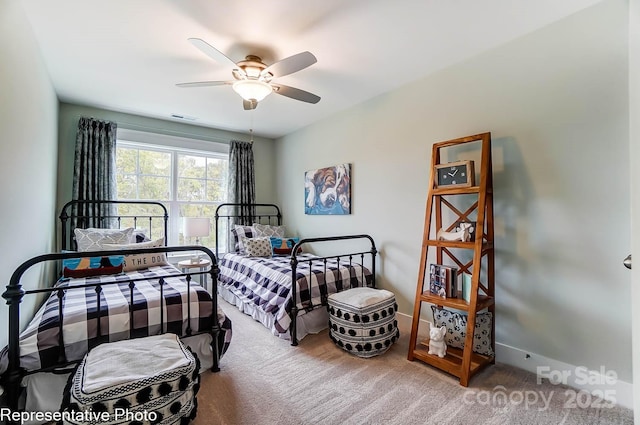 bedroom featuring ceiling fan and carpet flooring