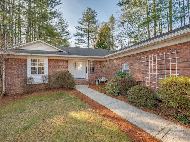 view of front of property with a front lawn