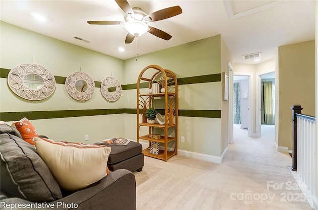 interior space with ceiling fan and light carpet