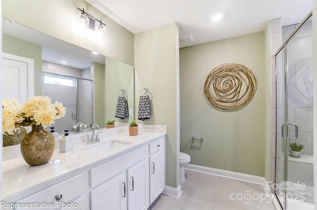 bathroom with vanity, an enclosed shower, tile patterned floors, and toilet