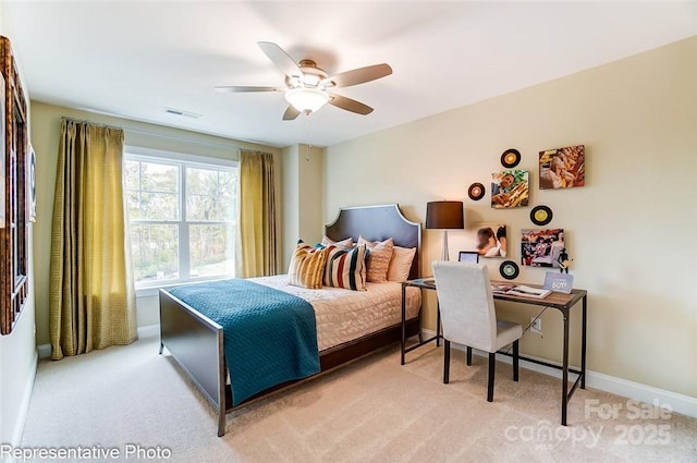 carpeted bedroom with ceiling fan