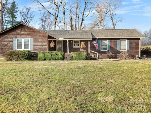 single story home with a front yard