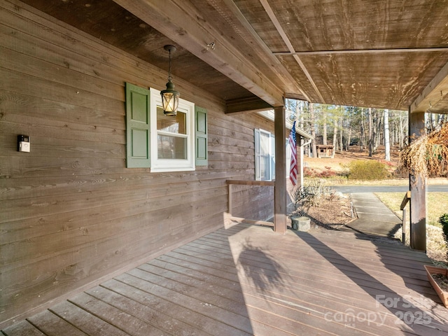 wooden deck featuring covered porch