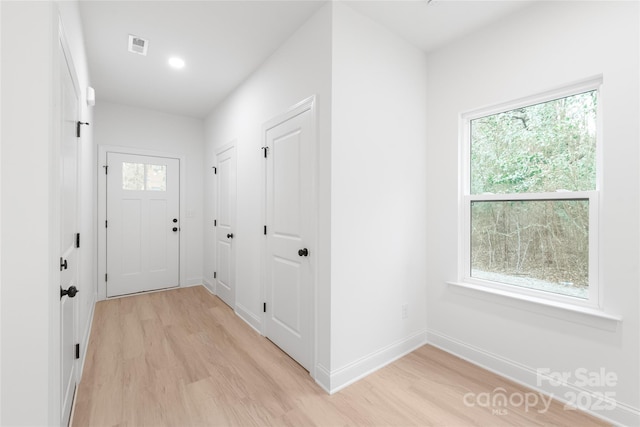 interior space with light hardwood / wood-style floors