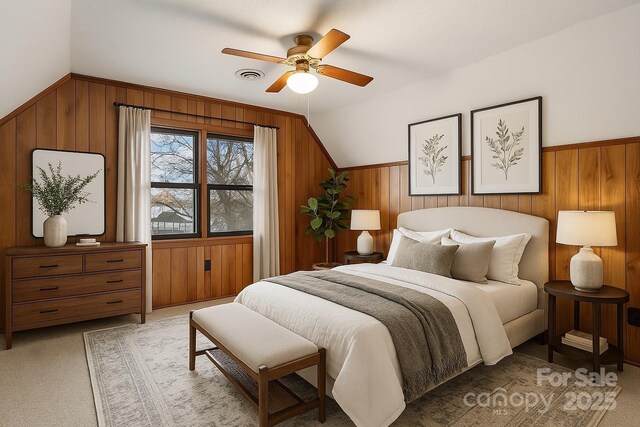 5580 Crepe Myrtle Rd, York, SC 29745 - carpeted bedroom with wood walls, ceiling fan, and a wainscoted wall