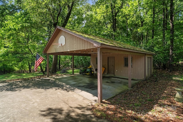 5580 Crepe Myrtle Rd, York, SC 29745 - view of car parking with concrete driveway and a carport