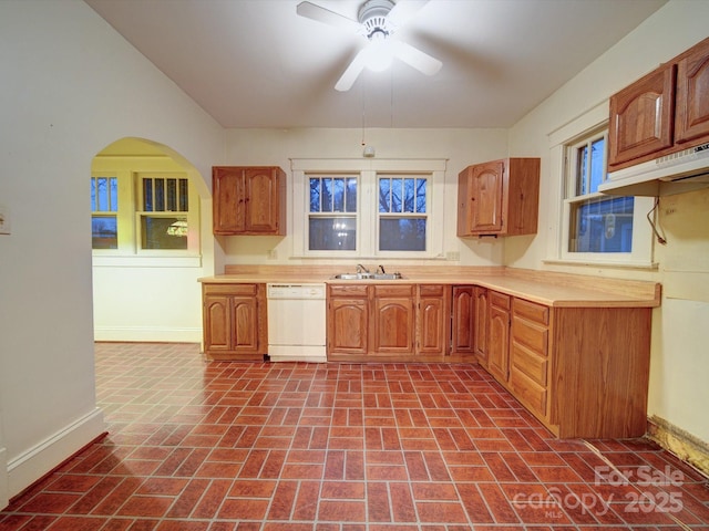 113 2nd St, Spencer, NC 28159 - kitchen with dishwasher, brick patterned floors, a sink, and baseboards