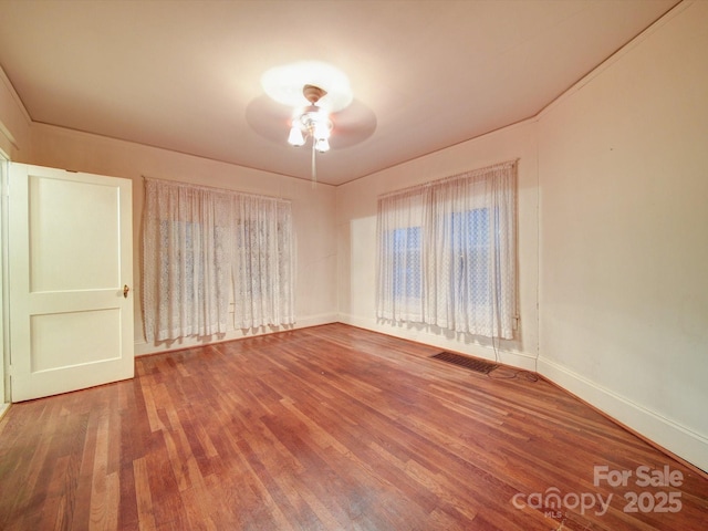 113 2nd St, Spencer, NC 28159 - unfurnished room featuring a ceiling fan, wood finished floors, and baseboards