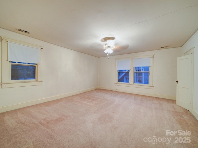 113 2nd St, Spencer, NC 28159 - unfurnished room with carpet flooring, a ceiling fan, and baseboards