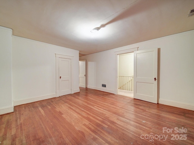 113 2nd St, Spencer, NC 28159 - bonus room featuring light wood-type flooring and baseboards