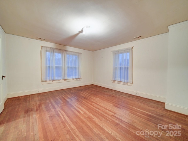 113 2nd St, Spencer, NC 28159 - unfurnished room featuring light wood-style flooring and baseboards