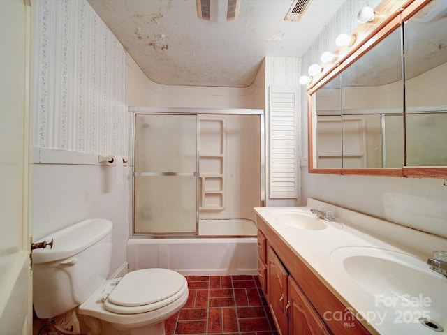 113 2nd St, Spencer, NC 28159 - full bath featuring toilet, double vanity, and combined bath / shower with glass door